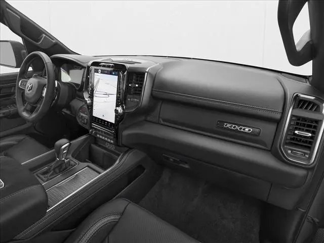 Armaturenbrett des RAM 1500 RHO, Beifahrerseite mit RHO-Emblem und 12-Zoll-Touchscreen