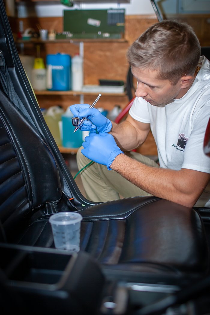 Chrome brightwork being polished on a Datsun 240Z