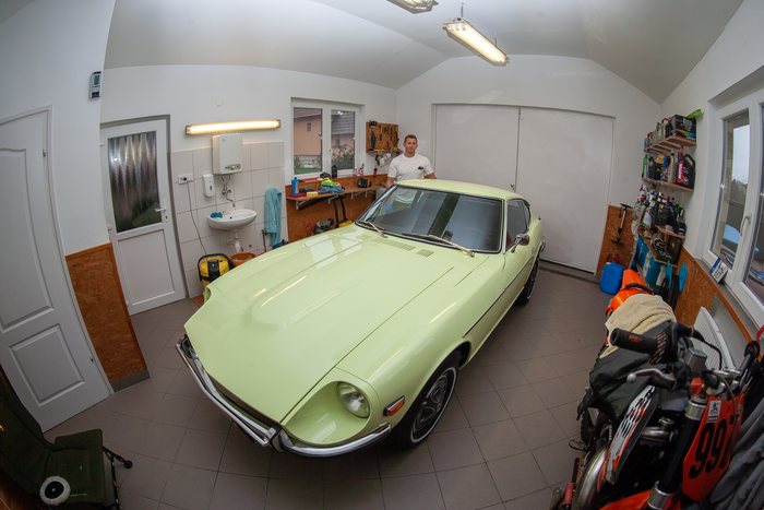 Datsun 240Z in the workshop with detailing work completed