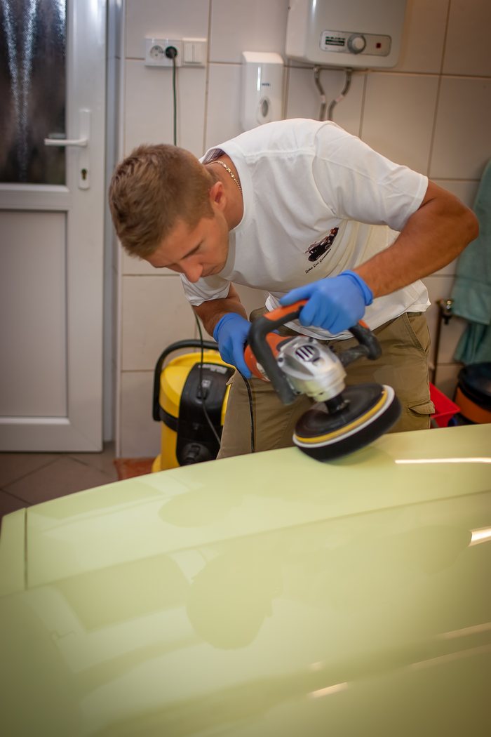 Interior of a Datsun 240Z being cleaned during detailing