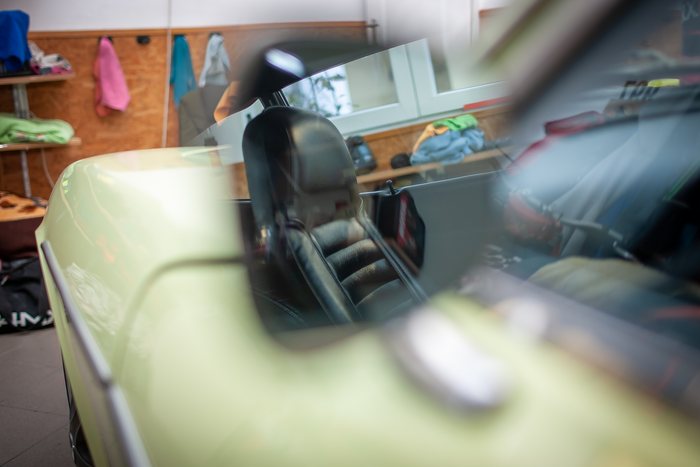 Seat and trim being cleaned inside a Datsun 240Z