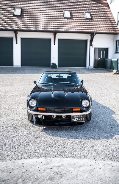 Black Datsun 280Z widebody photographed head-on