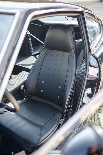 Driver's seat and roll bar inside a Datsun 280Z