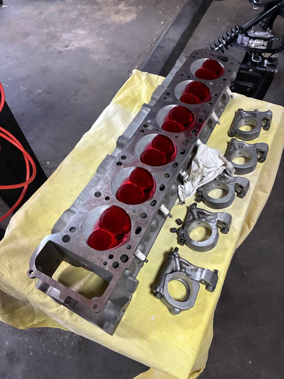 Datsun N42 combustion chamber dye valve seat work — 240Z engine rebuild