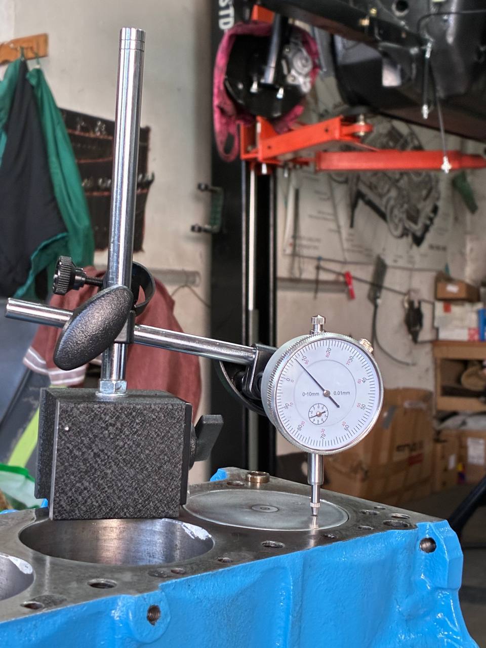 Datsun L24 dial indicator block measurement restoration shell background — 240Z