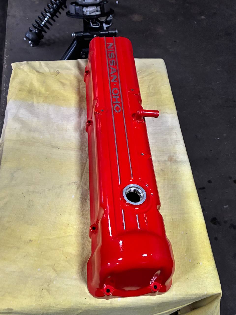 Datsun 240Z crank pulley refinished factory-correct Datsun blue — L24 engine