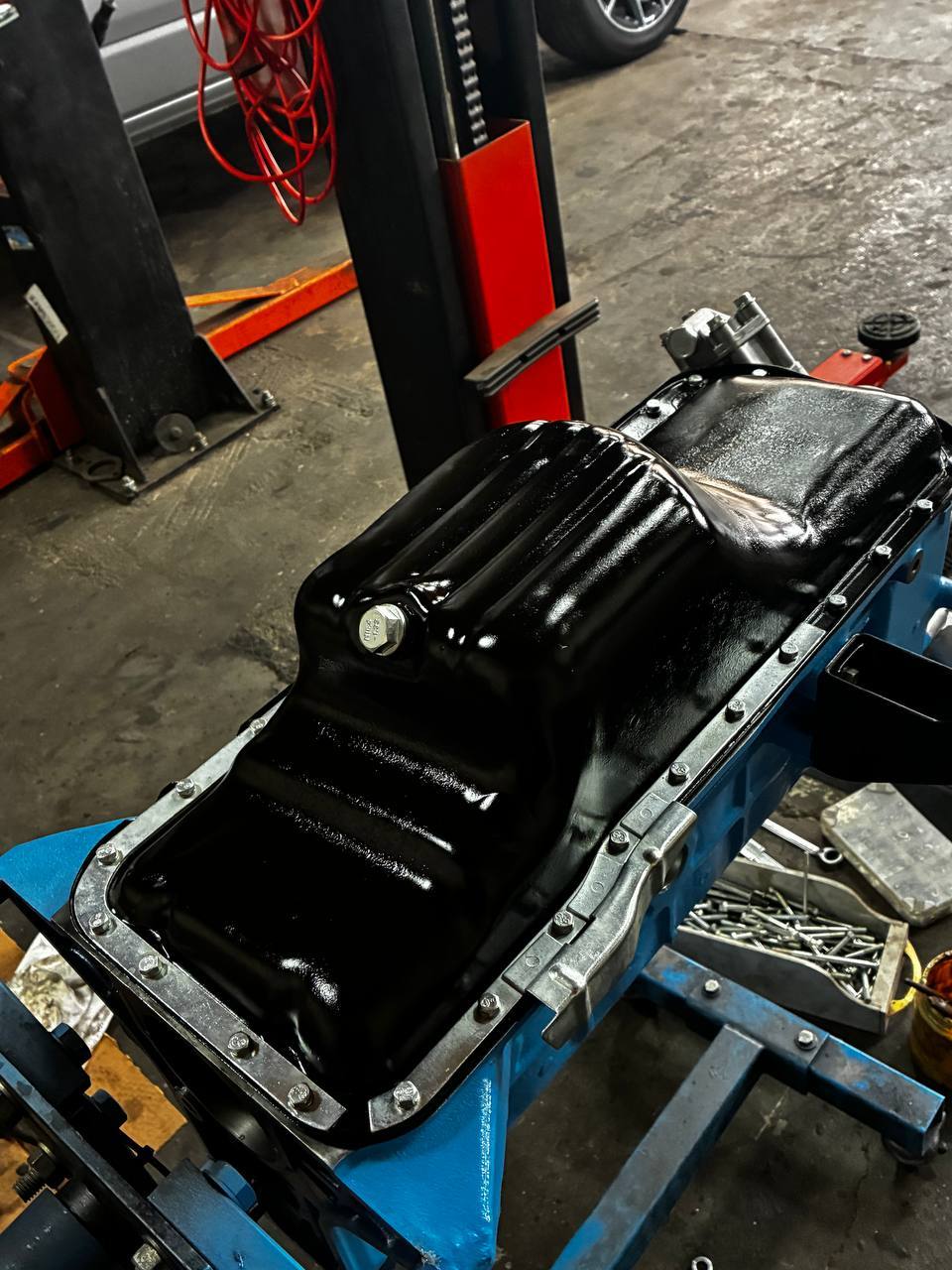 Datsun L24 oil pan gloss black clean — 240Z engine rebuild detail