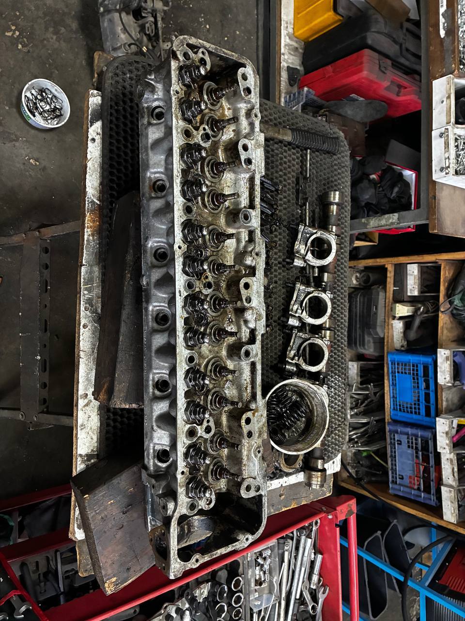 Datsun L24 cylinder head stripped valvetrain removed — S30 engine teardown