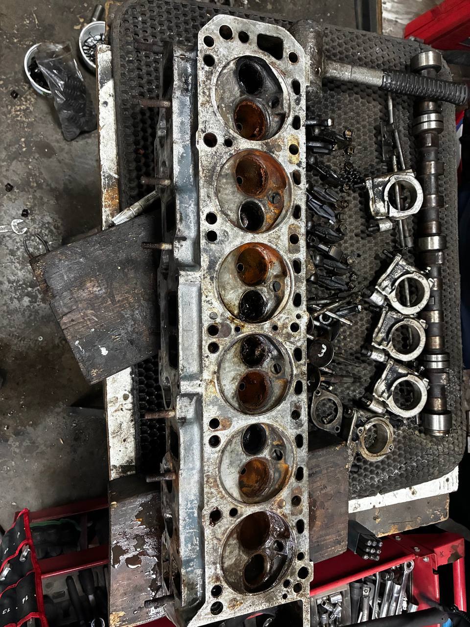 Datsun 240Z L24 cylinder head removed combustion chambers carbon before rebuild