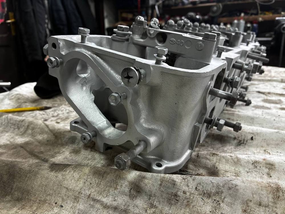 Datsun 240Z N42 cylinder head in blast cabinet before cleaning — engine rebuild