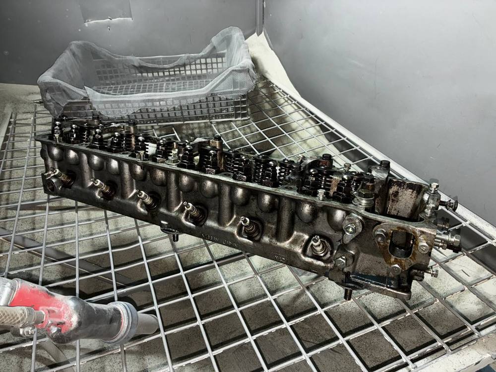 Refinished Datsun 240Z N42 cylinder head intake side casting — engine rebuild