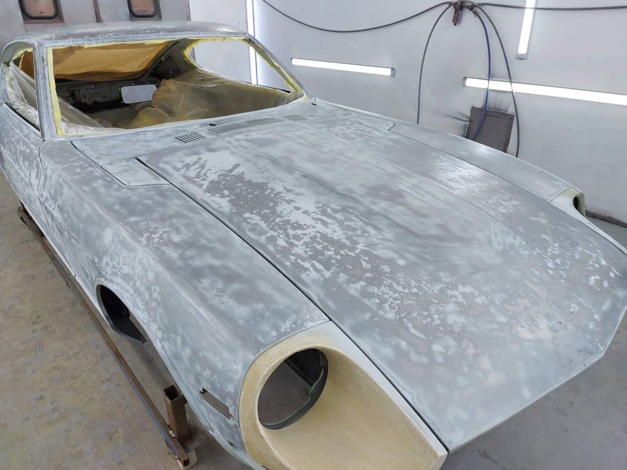 Datsun 240Z epoxy primer applied during welding process