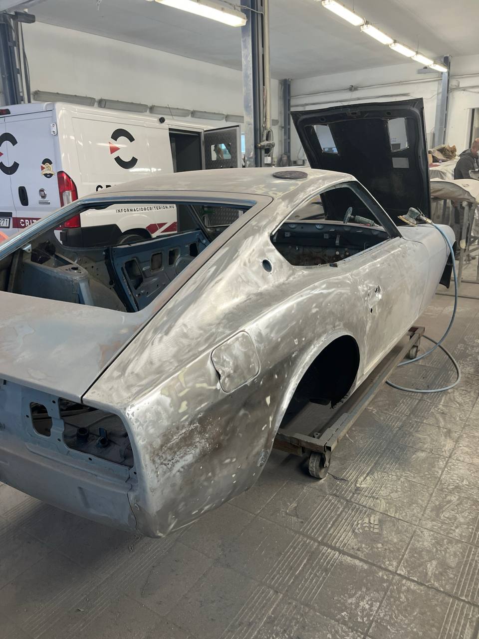 Datsun 260Z paint strip by hand — original paint removed during S30 restoration