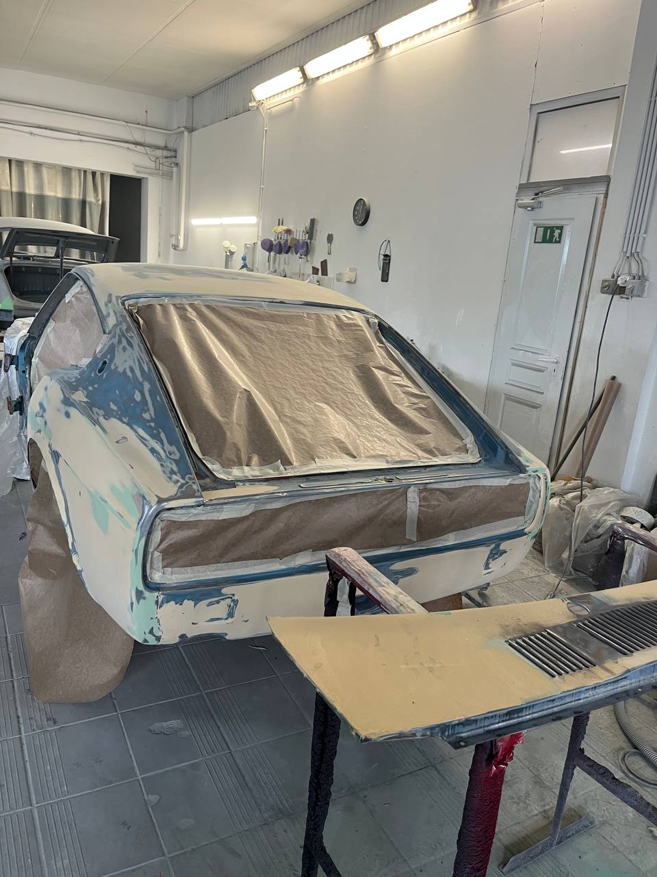 Datsun 260Z first primer coat applied — S30 restoration bodywork preparation