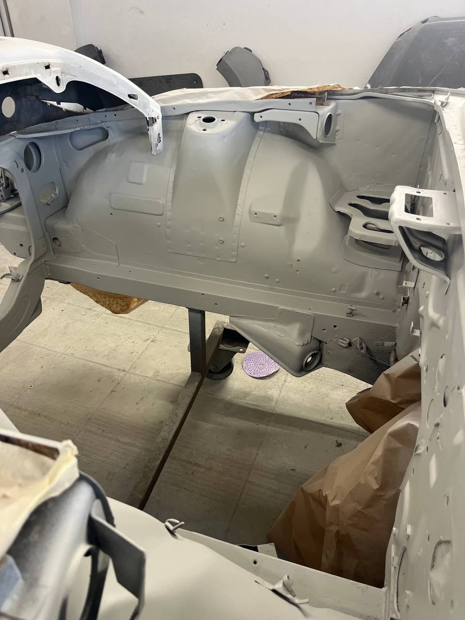Datsun 260Z primer completion — approaching colour-ready condition