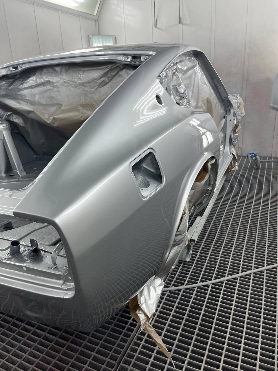 Datsun 260Z silver respray in progress — S30 widebody paint restoration