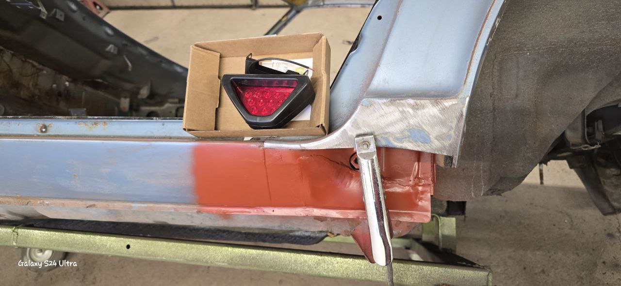 Datsun 260Z floor panel rust — common S30 corrosion area, correctly treated
