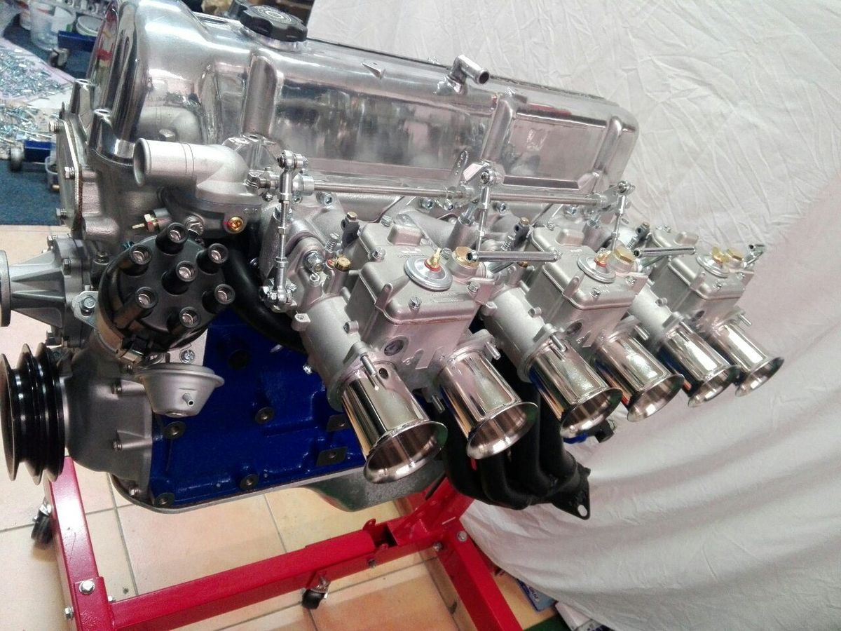 Weber carburettor linkage detail on a custom Datsun 280Z engine rebuild