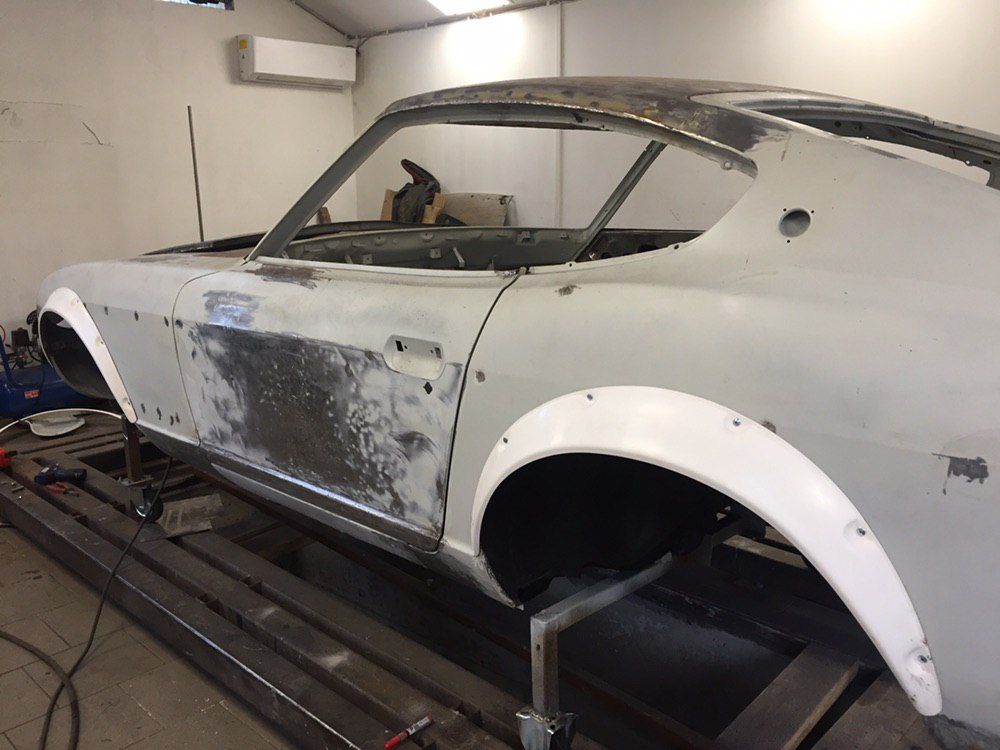 Fender flares fitted to a custom Datsun 280Z shell — wide arches for 17 inch wheels