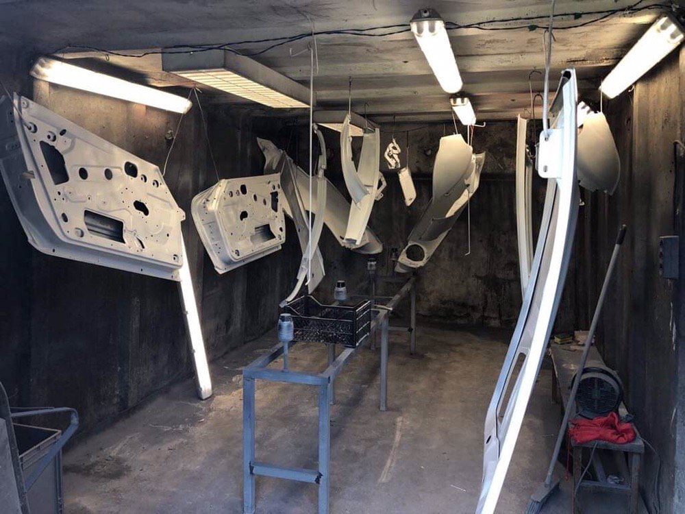 Original Datsun 280Z doors and panels media blasted individually — classic Datsun Z restoration