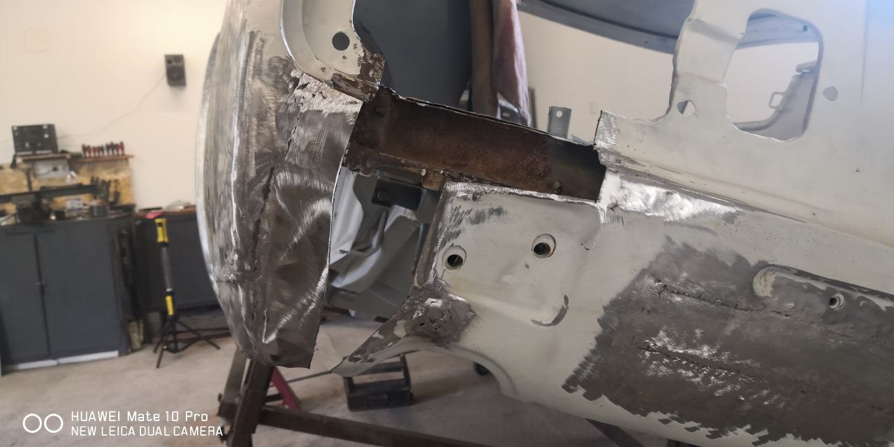 Datsun 280Z chassis leg strengthened and welded during structural rust repair