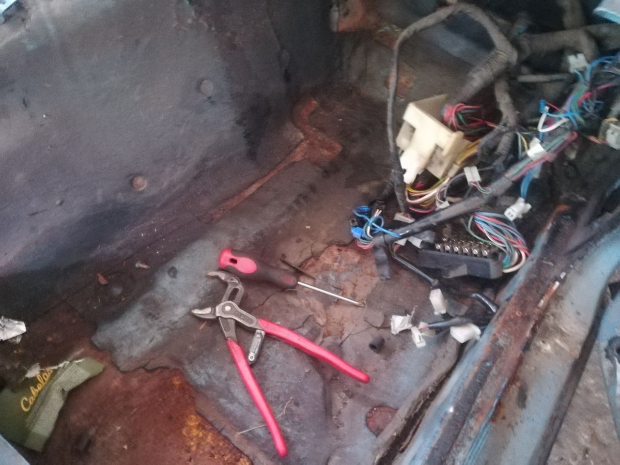 Datsun 280Z door stripped to the bare inner shell, glass and mechanism removed and catalogued