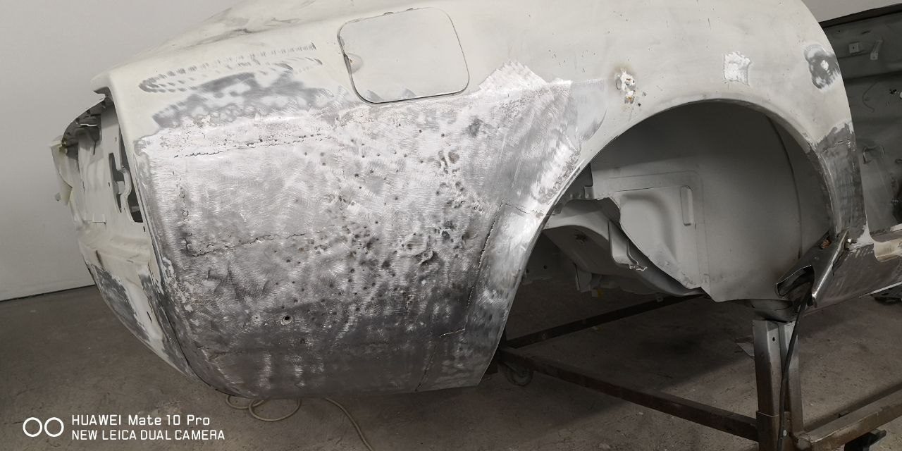 Datsun 280Z front end reviewed with all corroded metal replaced during restoration