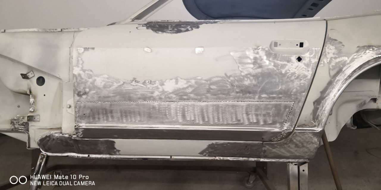 Lower door frame of the Datsun 280Z with rust cut out and replaced with fresh metal