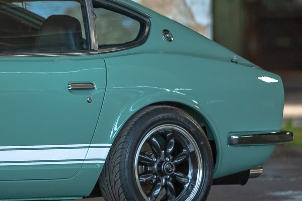 Green Datsun in the factory - 0050