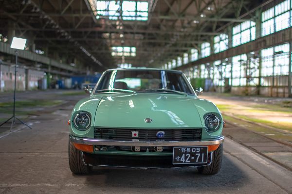 Green Datsun in the factory - 0080