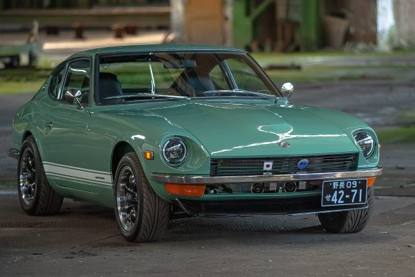 Green Datsun in the factory - 0081