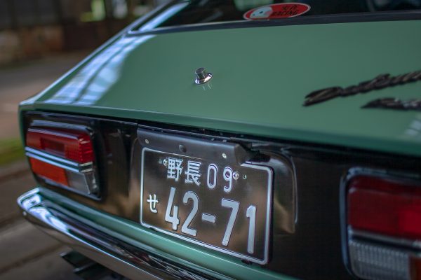 Green Datsun in the factory - 0109
