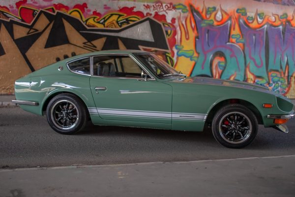 Green Datsun in the factory - 0257