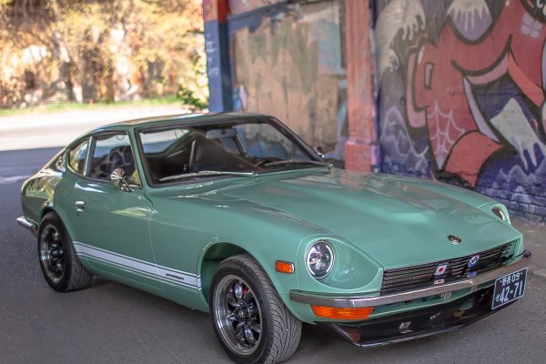 Green Datsun in the factory - 0295