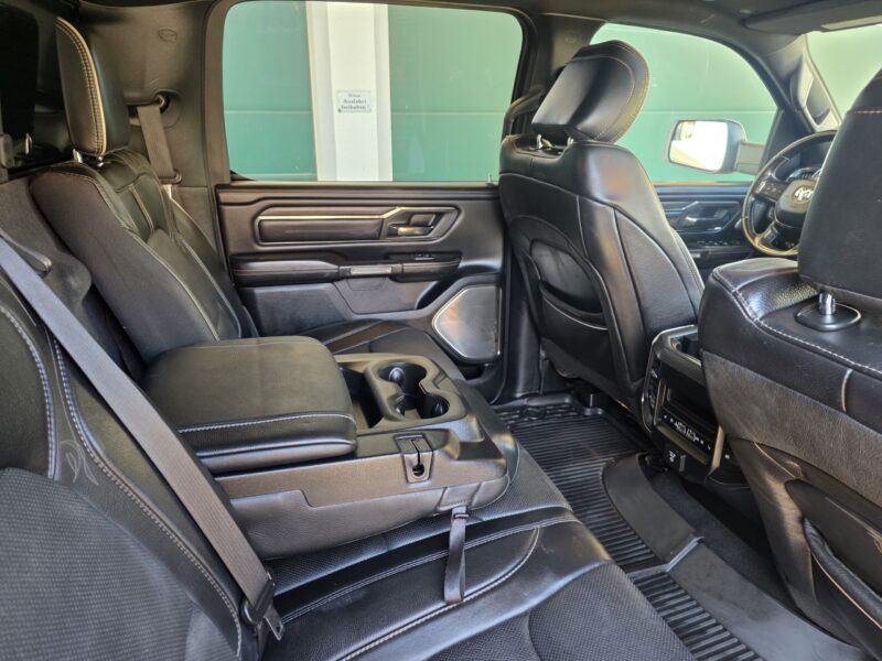 dodge Ram 1500 Gen 5 2022 Limited Black pickup truck interior and centre console and rear passenger leather seat
