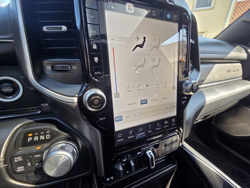 dodge Ram 1500 Gen 5 2022 Limited Black pickup truck interior large infotainment screen